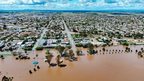 Aerial photo of the Shepparton Floods, October 2022, showing the flooded river encroaching on a residential area. 