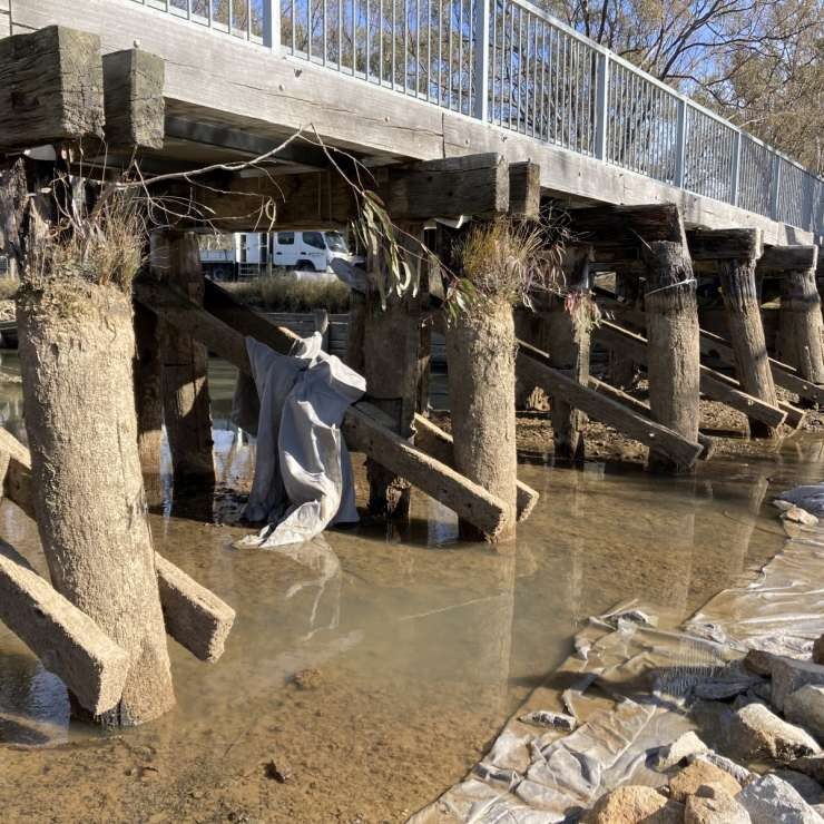 Grass growing from degraded pier