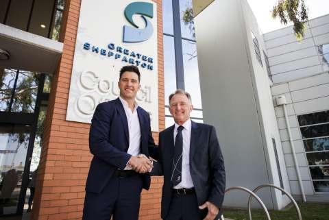 Deputy Mayor Geoff Akers is congratulated by Mayor Shane Sali.